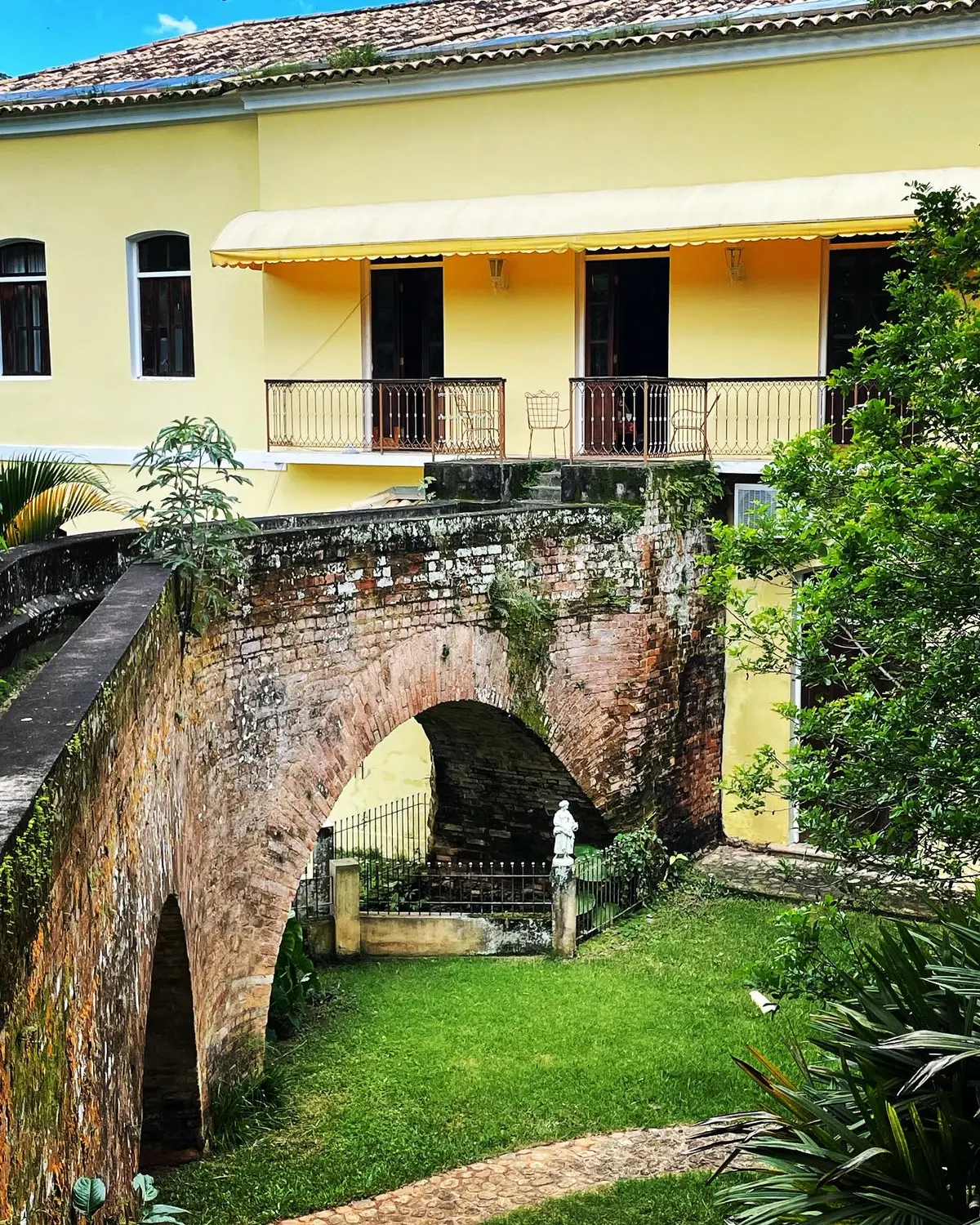 Historic stone aqueduct at Fazenda Neuchatel, which once fed the manor's water wheel
